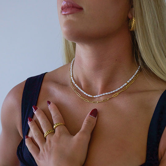 blonde model wearing plated gold chain rope ring Australia 