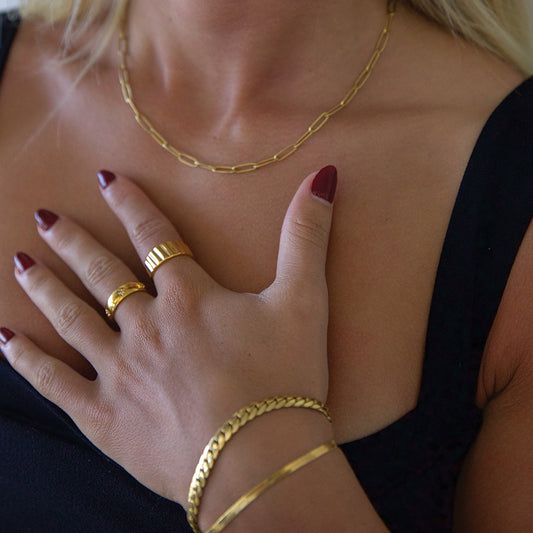 model wearing gold plated jewellery cubic zirconia ring