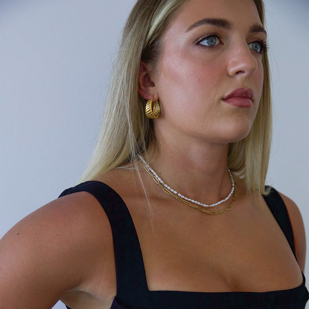 blonde model wearing hoop gold plated earrings Australia 