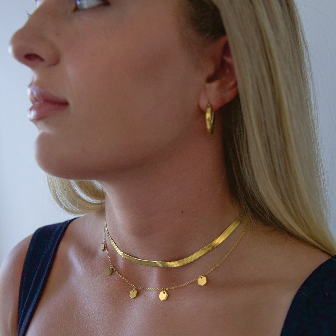 Blonde model wearing snake chain necklace Australia 