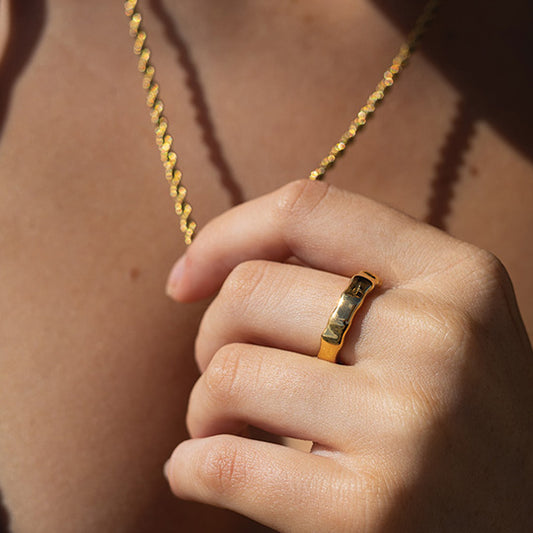 Blonde model wearing gold plated bone ring Australia 